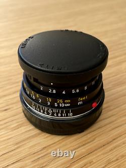 Leica 40mm f/2 Summicron-C Lens With Original Folding Lens Hood