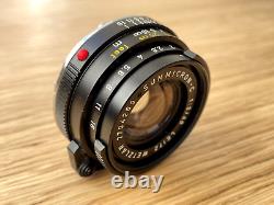 Leica 40mm f/2 Summicron-C Lens With Original Folding Lens Hood