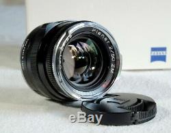 Zeiss Planar T 50mm 2.0 ZM Leica Mount with Lens Hood Black mint in box